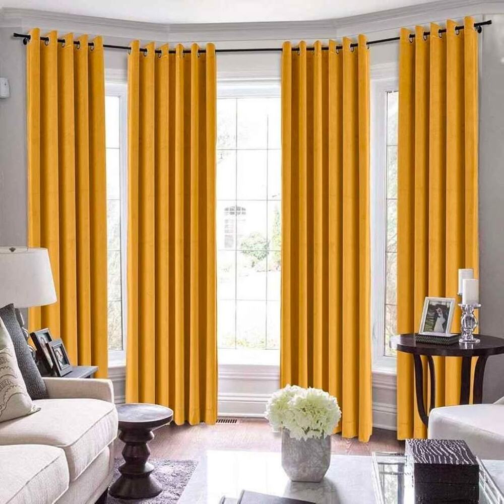 Four 52"W x 90"L golden yellow velvet curtains